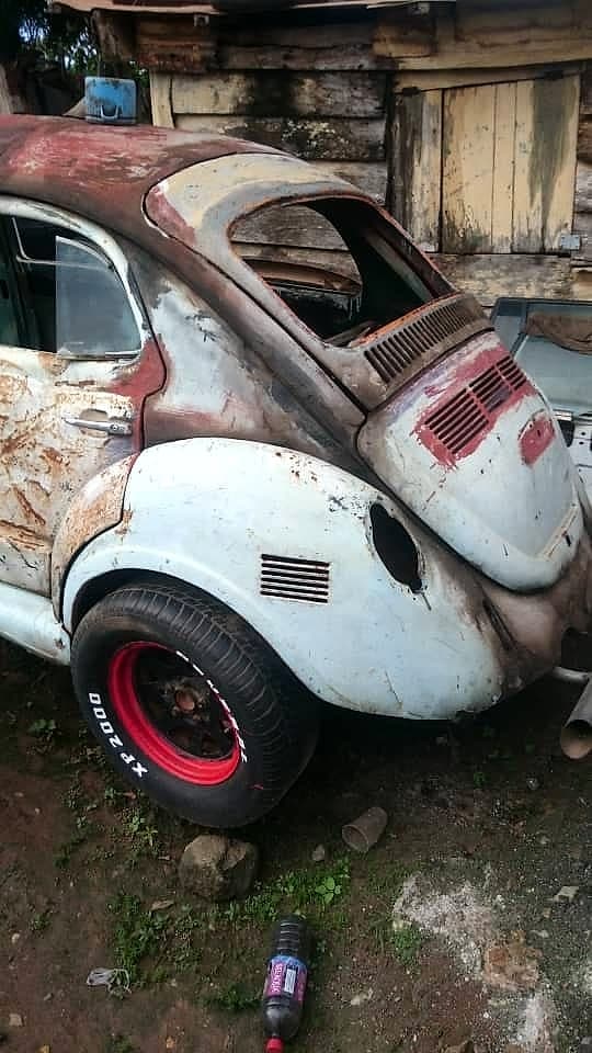 Volkswagen Beetle restoration project with patina, photographed in Africa